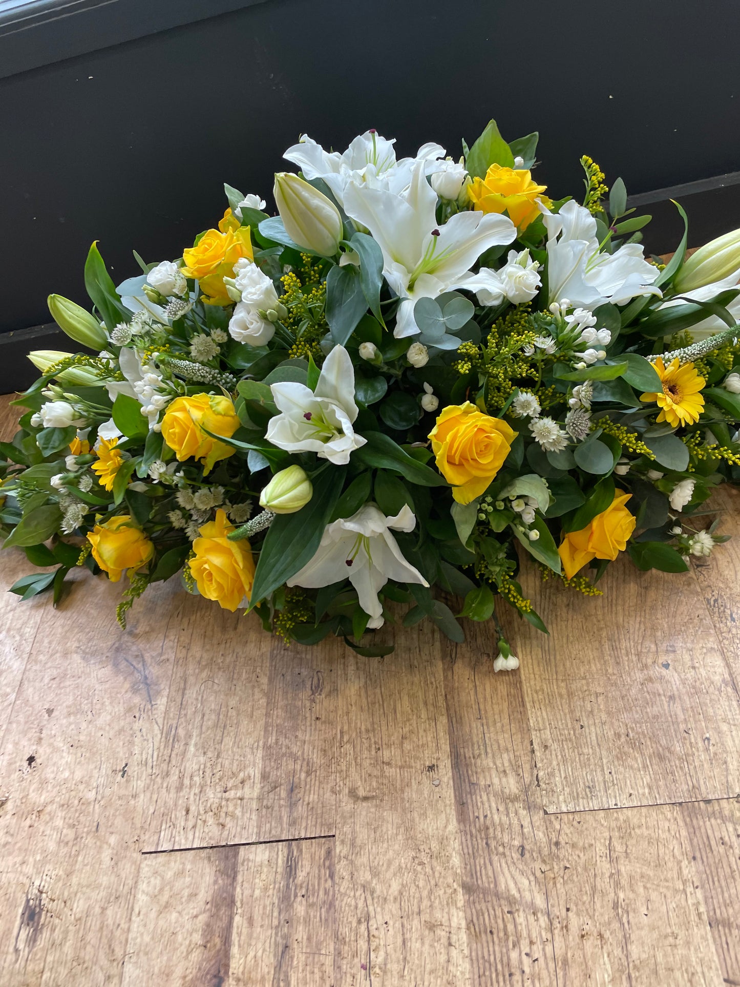 Yellow rose and white lily spray ( casket)