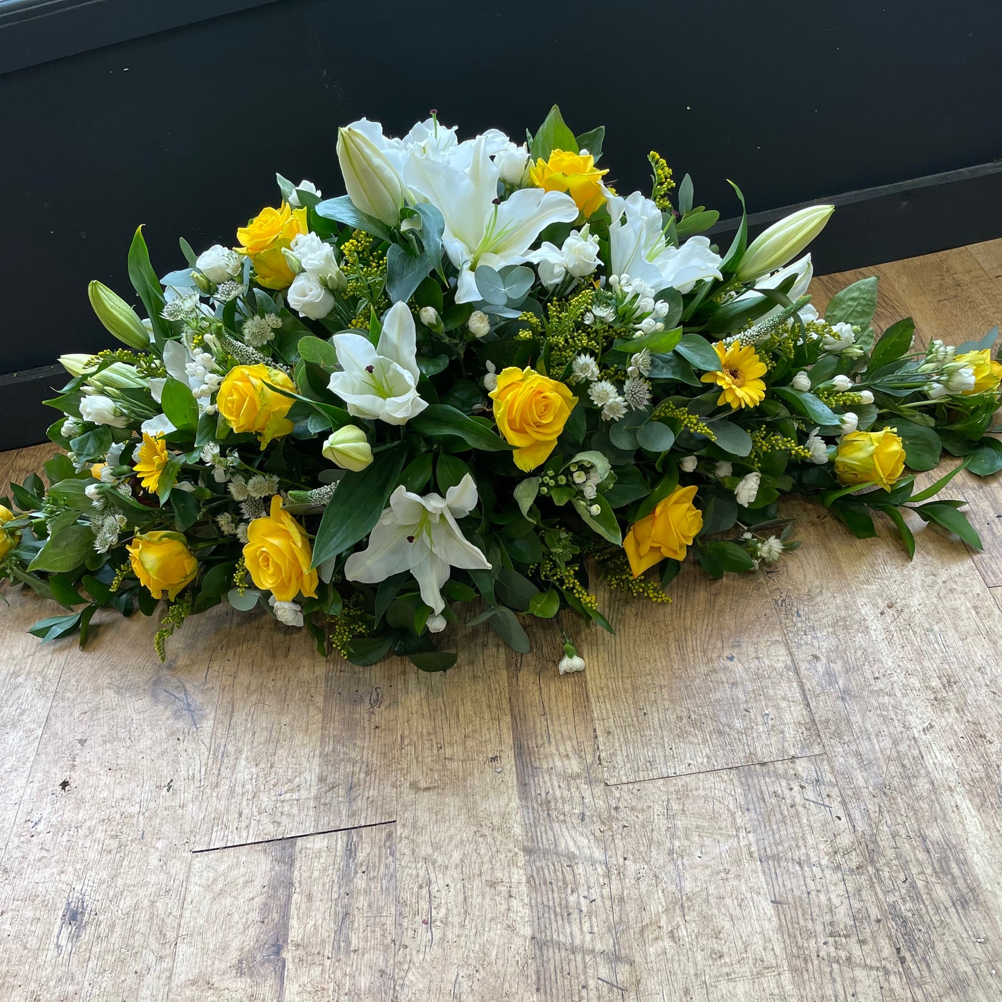 Yellow rose and white lily spray ( casket)