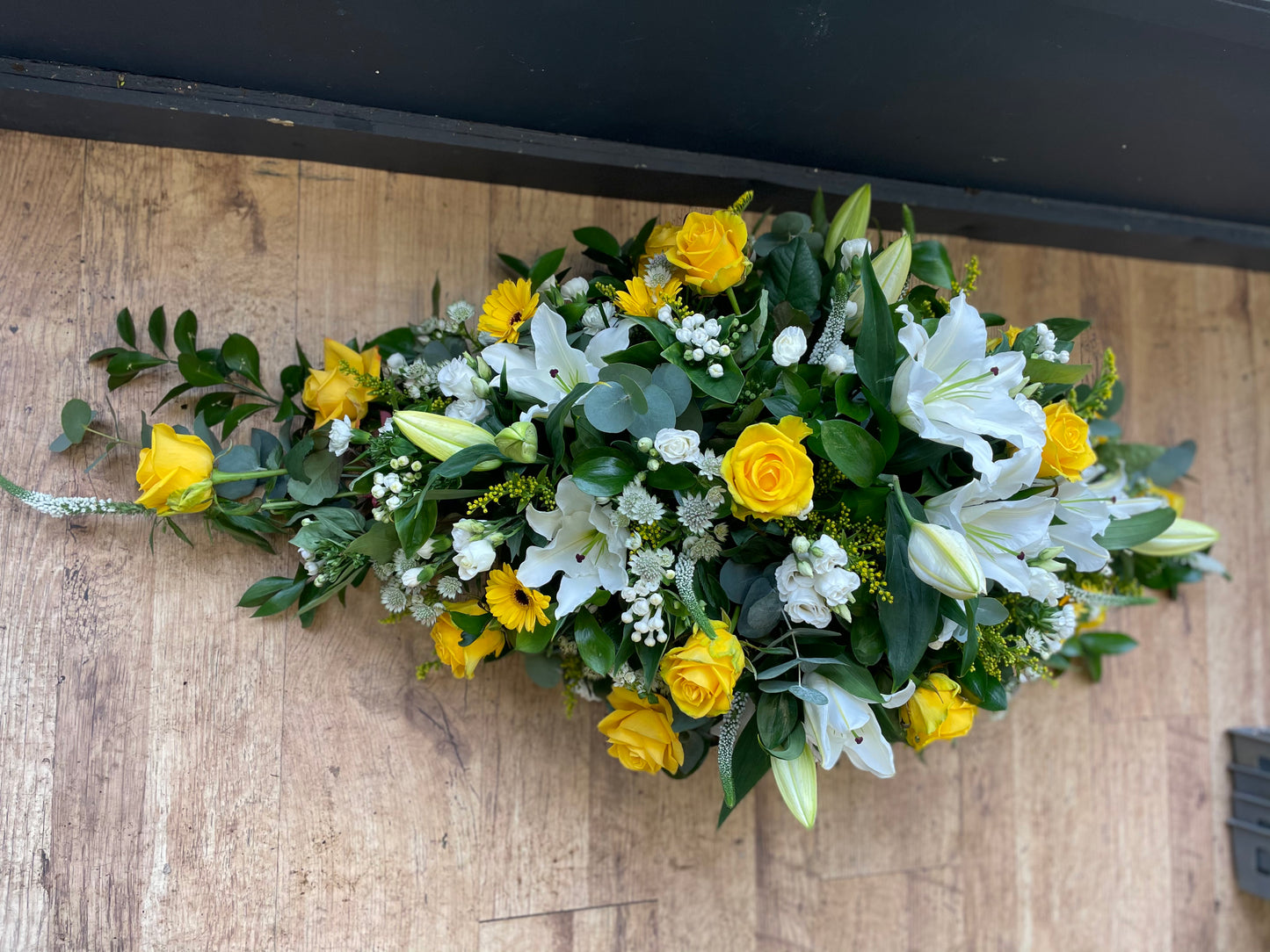 Yellow rose and white lily spray ( casket)